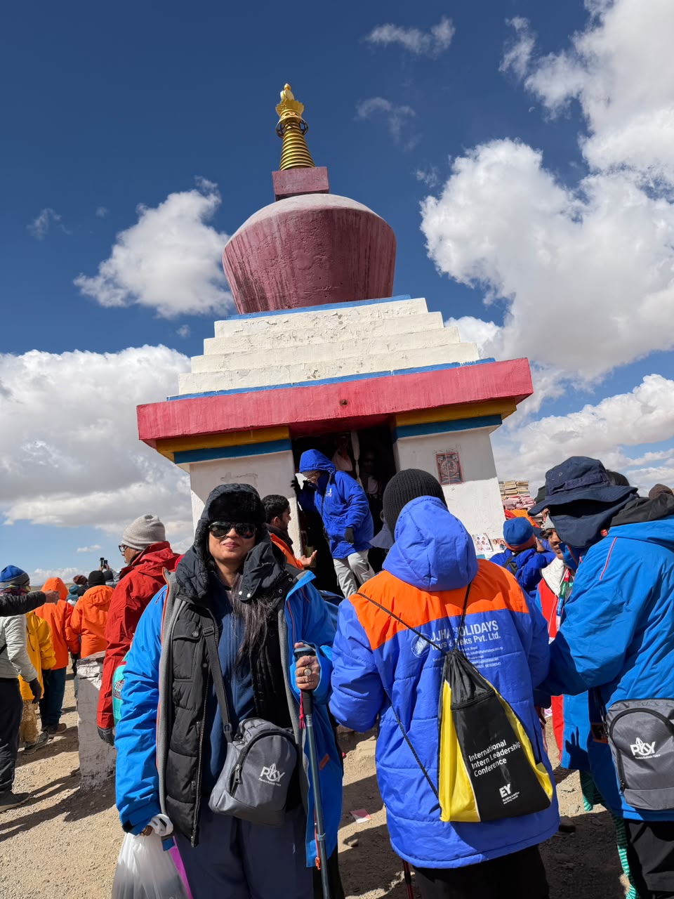 Fellow pilgrims gathered at a stupa