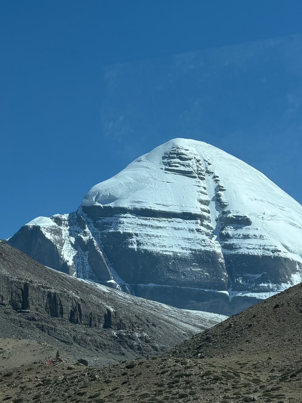 Mount Kailash rising above the Barkha plain under a clear sky